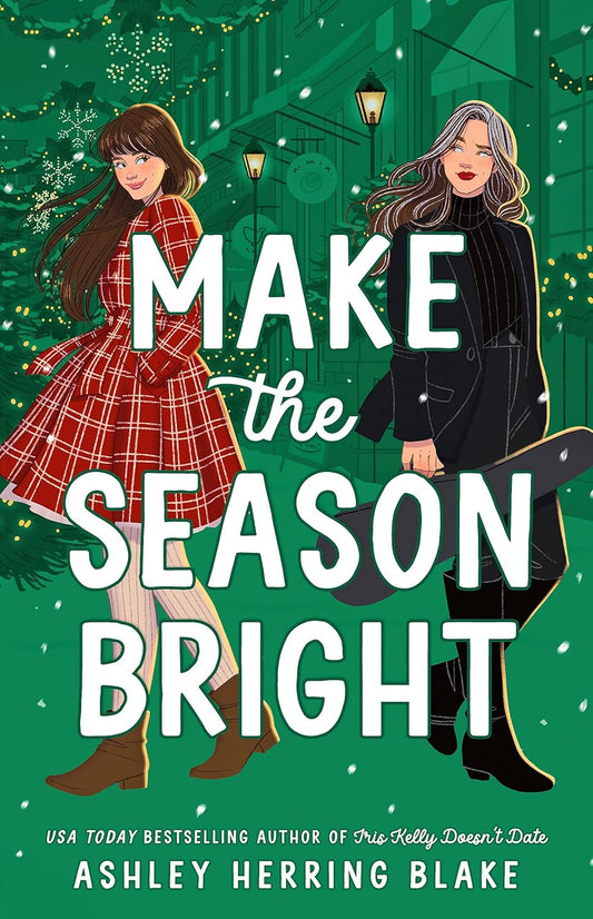 Two white women in winter attire both walk down a Christmas decorated high street, checking each other out. White text sits on top that reads "Make the Season Bright".