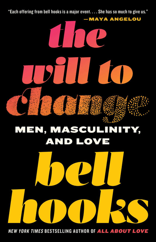 The black book cover for The Will to Change has the title and author name on the cover in pink, orange, and yellow.