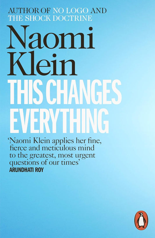 The blue book cover for This Changes Everything by Naomi Klein.